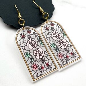 NWT Behind the glass Earrings